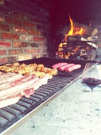 High angle view of meat on barbecue grill