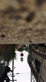 Cars on sea against sky