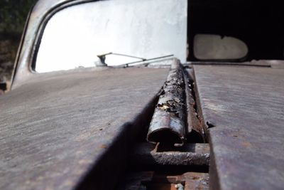 Close-up of old abandoned vintage car