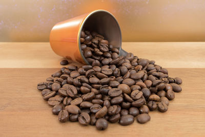 Close-up of coffee beans on table