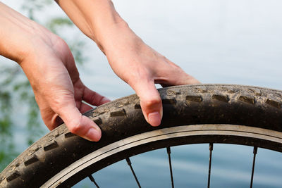 Midsection of person riding bicycle