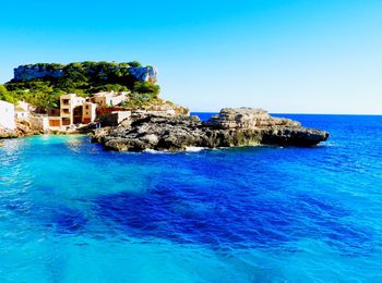 Scenic view of sea against clear sky