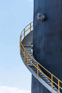 Low angle view of spiral staircase against sky