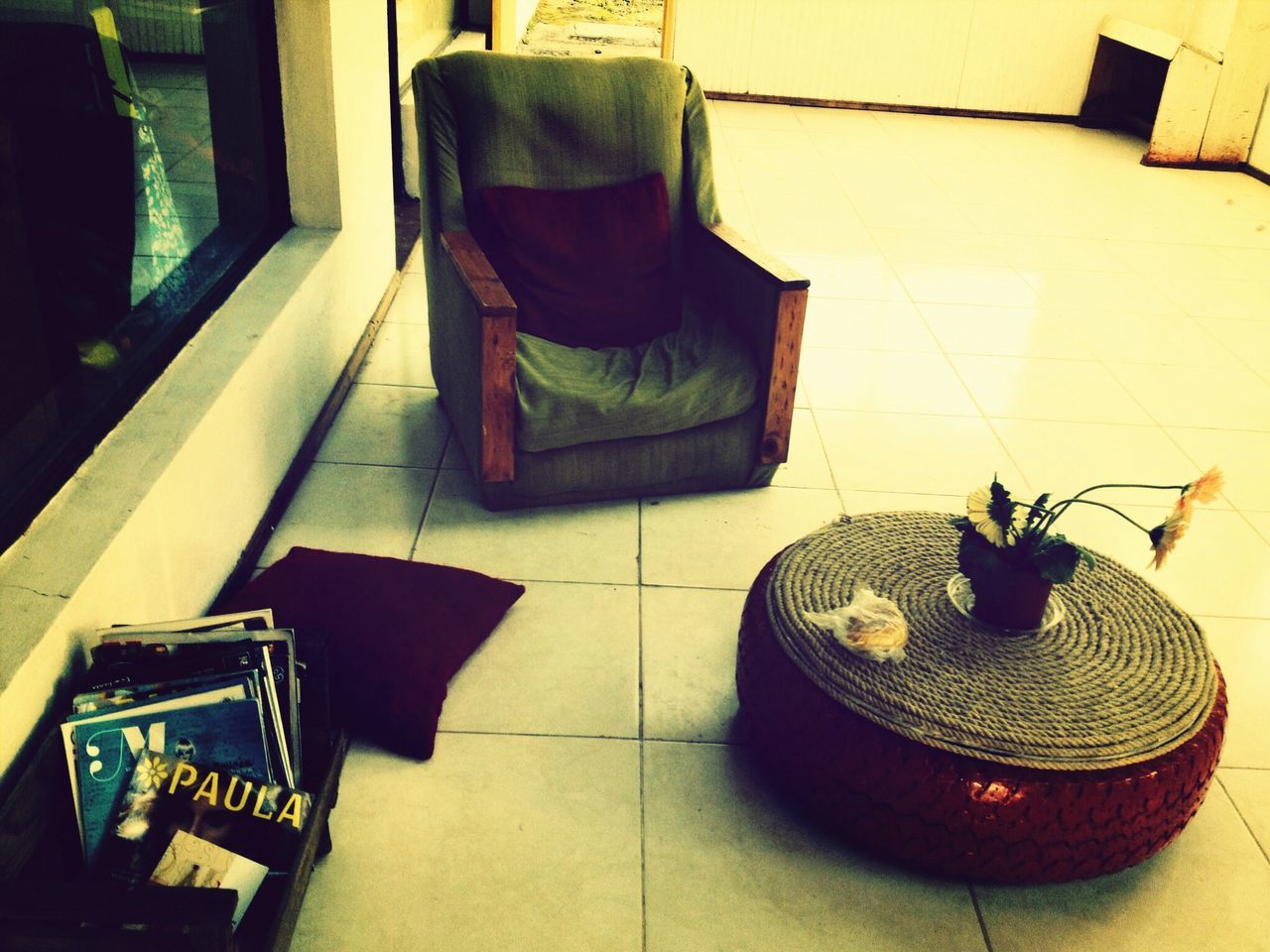 indoors, chair, high angle view, architecture, built structure, no people, table, house, home interior, furniture, absence, building exterior, day, hanging, sunlight, tiled floor, sofa, flooring, shelf, still life