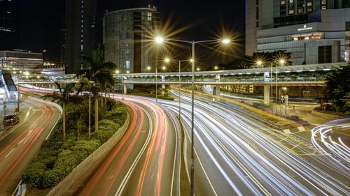 Light trails on city street at night