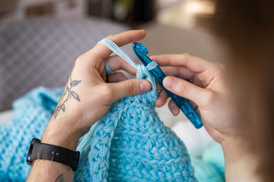 Cropped hand of woman holding dental equipment