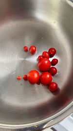 High angle view of cherries in container