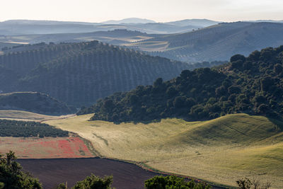 High angle view of landscape and mountains against sky