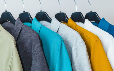 Close-up of clothes hanging on rack