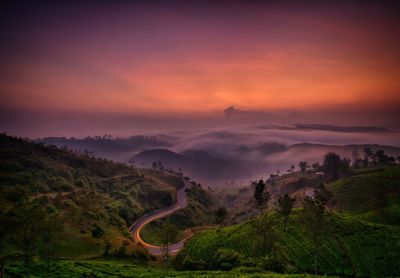 Scenic view of landscape against sky during sunset