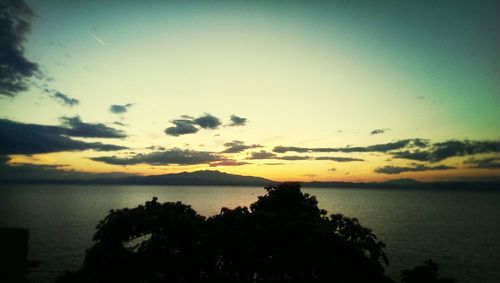 Scenic view of sea at sunset