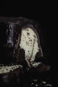 Close-up of bread in black background