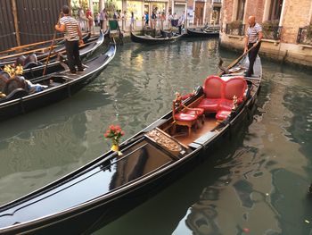 Boats moored in canal