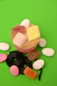 Close-up of multi colored candies on table