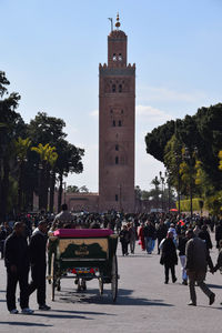 Group of people in front of historical building