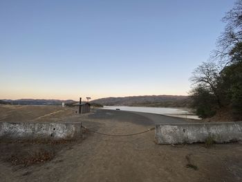 Scenic view of road against clear sky