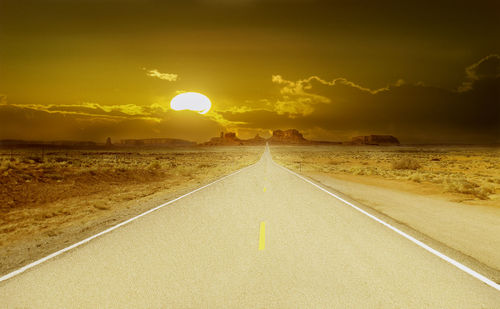 Empty road at sunset