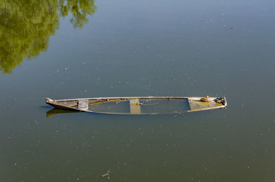 High angle view of boat moored in lake