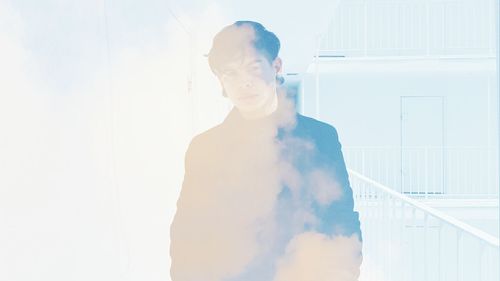 Close-up of woman standing in pond