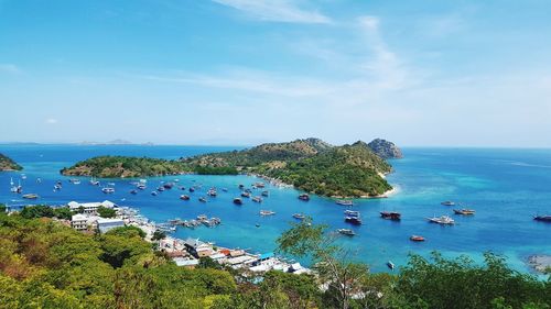 High angle view of sailboat on sea shore against sky