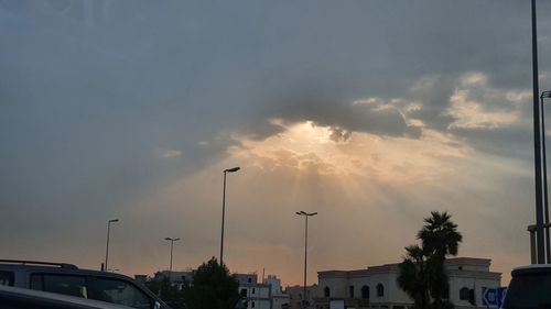 Low angle view of silhouette buildings against sky during sunset