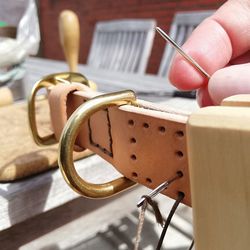 Close-up of person hand on table