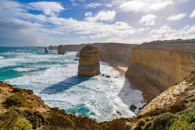 Scenic view of sea against cloudy sky