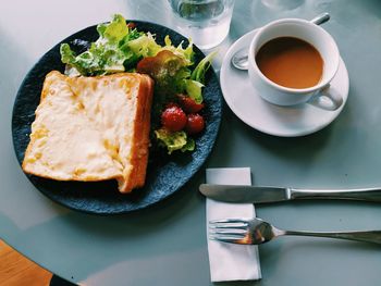 High angle view of breakfast served on table