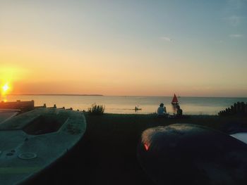 Scenic view of calm sea at sunset