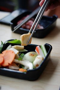 Close-up of salad in bowl on table