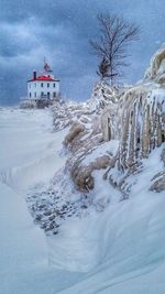 Scenic view of frozen sea against sky