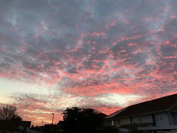 Low angle view of dramatic sky during sunset