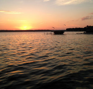 Scenic view of sea at sunset