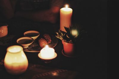 Close-up of lit tea light candles