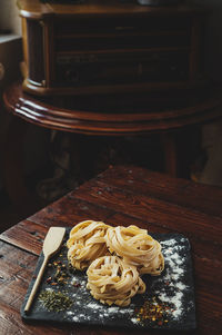 Delicious fresh italian pasta, fettuccini with spices.