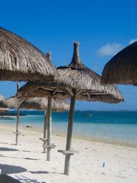 View of beach against blue sky