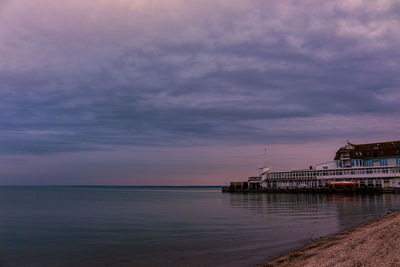 Scenic view of sea against sky at sunset