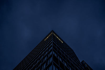 Low angle view of building against sky at night