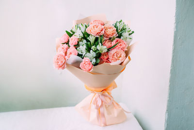 Luxurious bouquet of fresh pastel pale pink roses