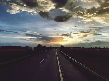 Road against sky during sunset