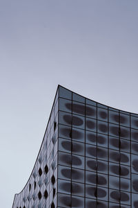 Low angle view of modern building against clear sky