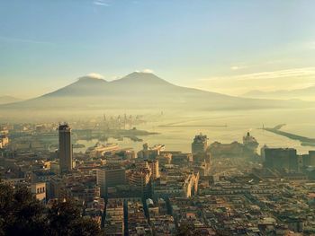 High angle view of buildings in city against sky