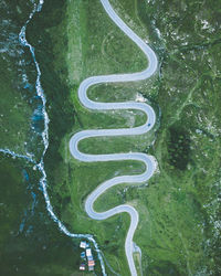 Aerial view of road amidst trees