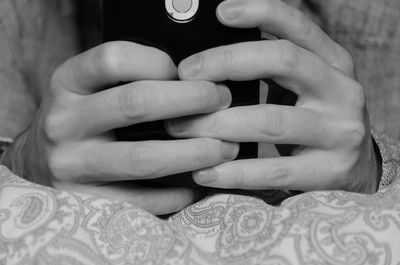 Close-up of woman holding hands
