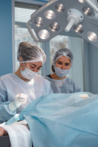 Portrait of young woman in hospital