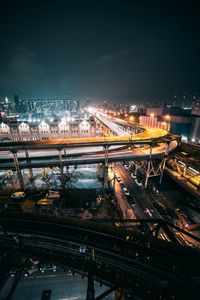 High angle view of illuminated city at night