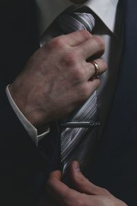 Close-up of man hand in car