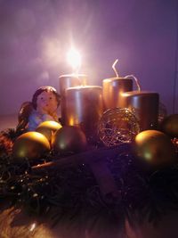 Close-up of lit tea light candles