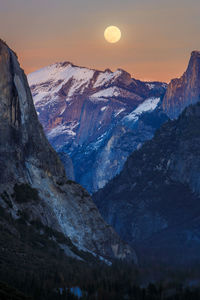 Scenic view of mountains against sky during sunset