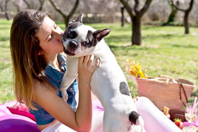 Close-up of woman with dog